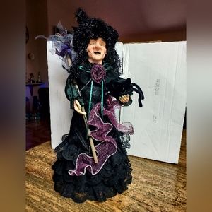 Witch Tree topper Holding a cat and wand.